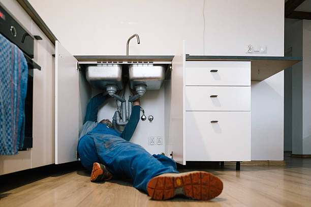 Professional Drain Cleaning technician working in Sheldahl, IA